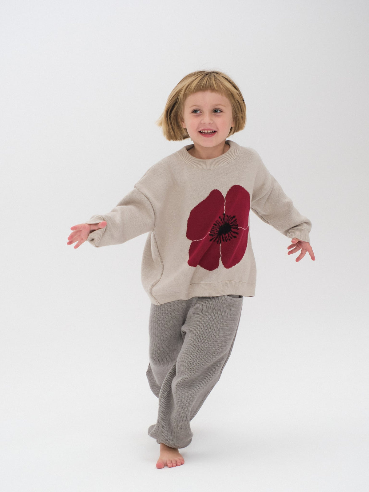 PULLOVER MIT MOHNBLUME